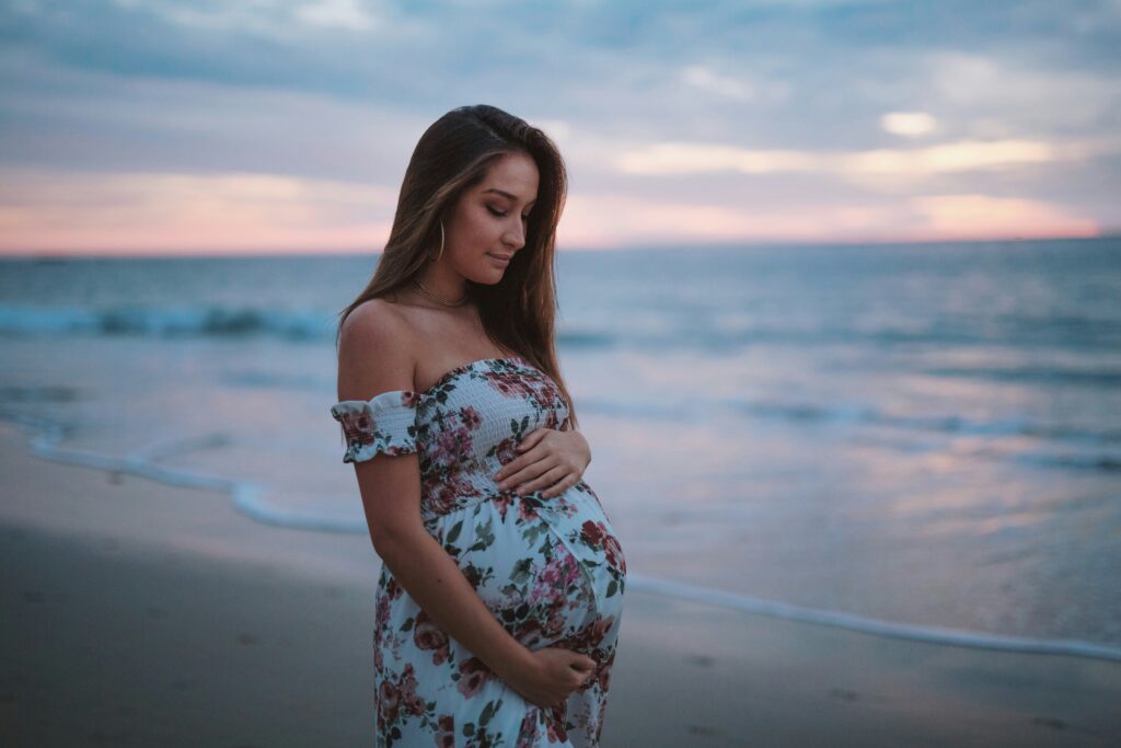 Pregnant lady on beach, 